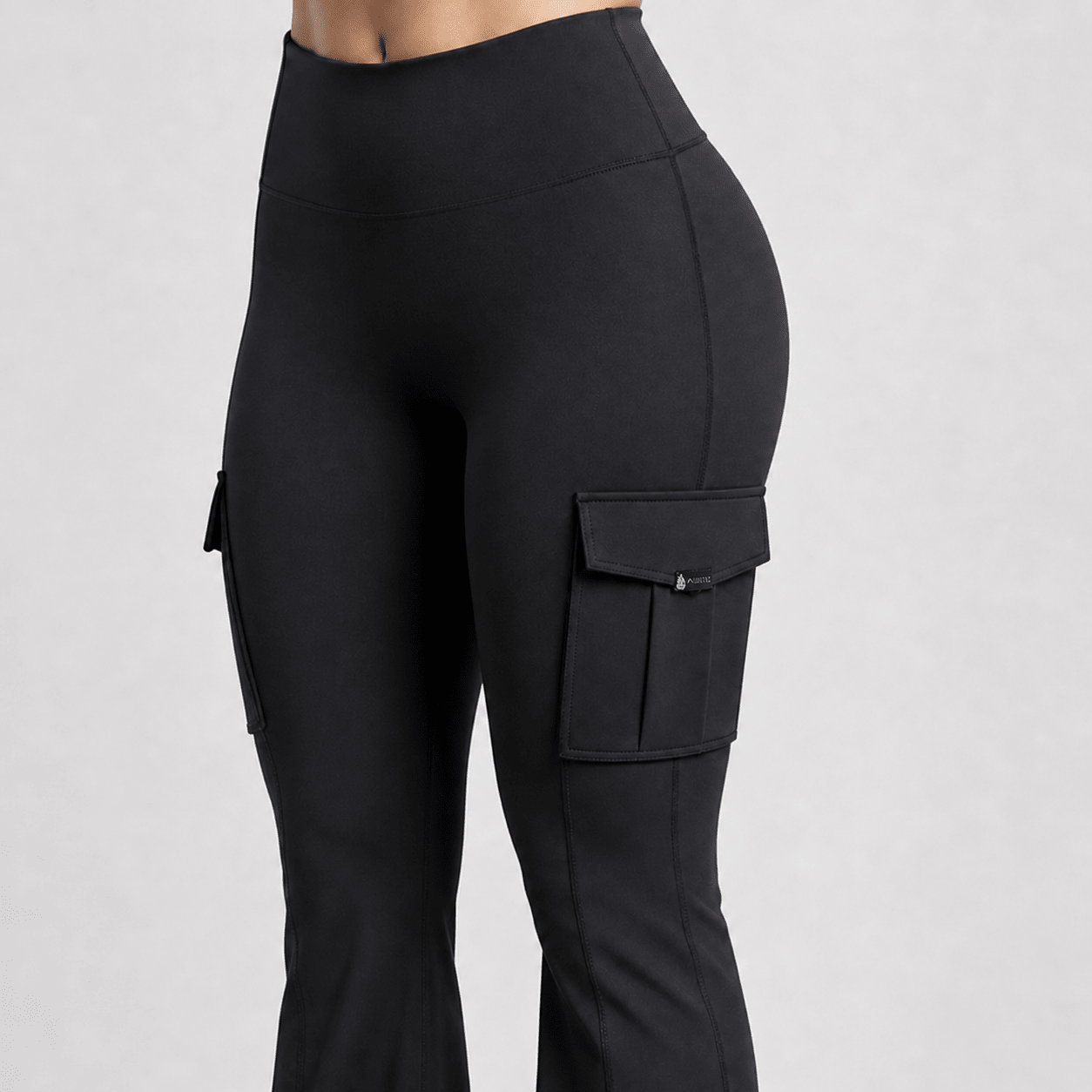 Black cargo pants on a gray background
