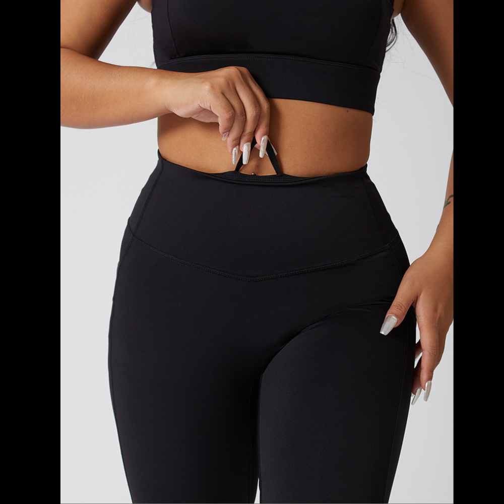 a close up view of the front of the leggings showing an adjustable waistband