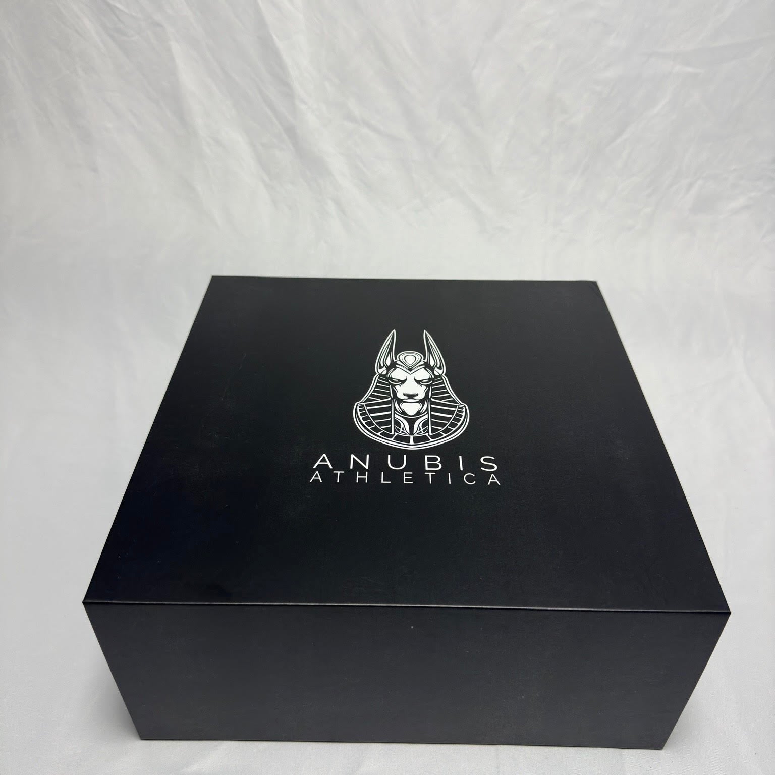 the large black box the hoodies are sent in with a white print of the company logo in the center