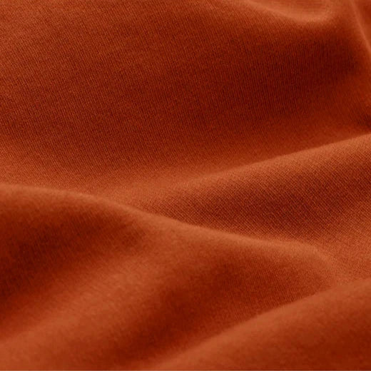 close up of clay colored hoodie fabric