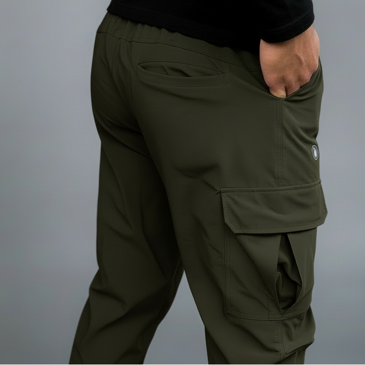 Green cargo pants with a brand logo on a gray background
