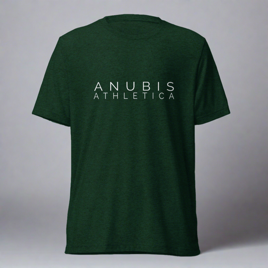 tee shirt with the name Anubis Athletica printed in white in the center. The shirt is color emerald green